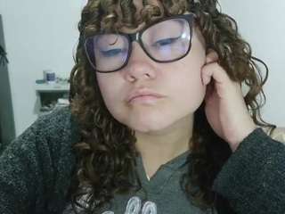 curly-greeneyed