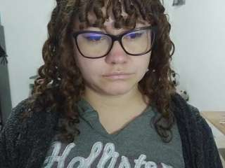 curly-greeneyed