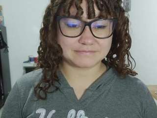 curly-greeneyed