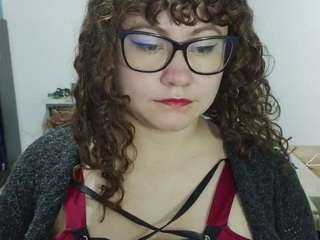 curly-greeneyed