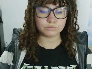 curly-greeneyed