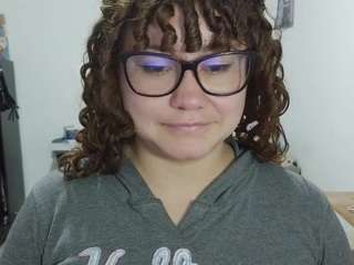 curly-greeneyed
