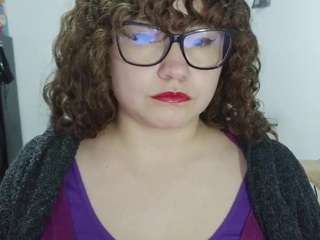 curly-greeneyed