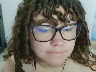 curly-greeneyed
