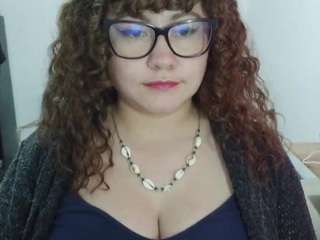 curly-greeneyed