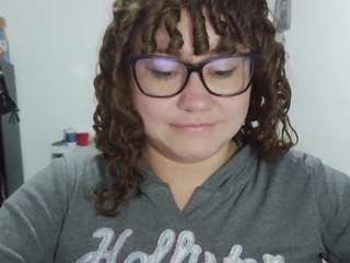 curly-greeneyed