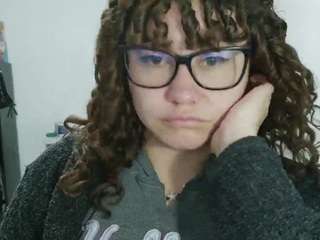 curly-greeneyed