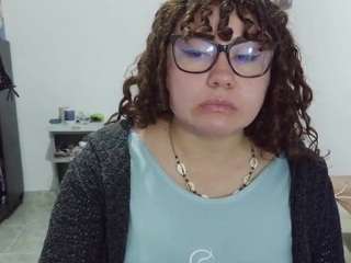curly-greeneyed