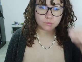 curly-greeneyed