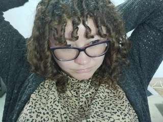 curly-greeneyed