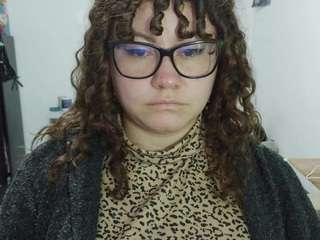 curly-greeneyed