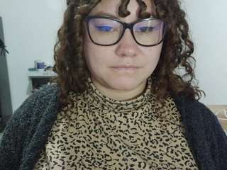 curly-greeneyed