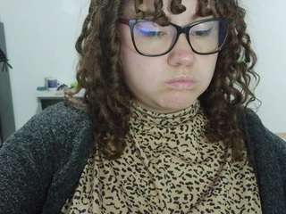 curly-greeneyed