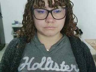 curly-greeneyed