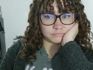 curly-greeneyed