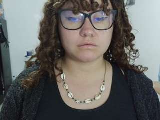 curly-greeneyed