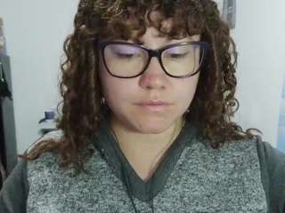 curly-greeneyed