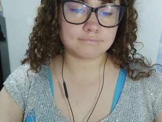 curly-greeneyed