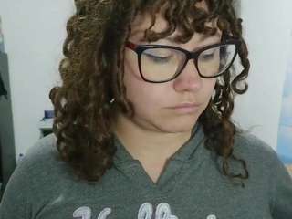 curly-greeneyed