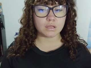 curly-greeneyed