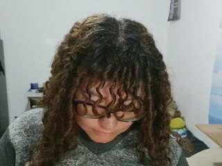 curly-greeneyed