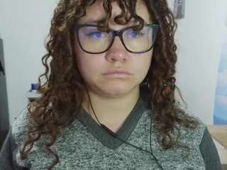 curly-greeneyed
