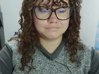 curly-greeneyed