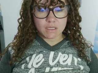 curly-greeneyed