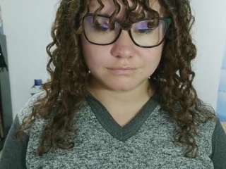 curly-greeneyed