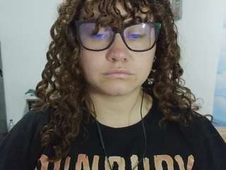 curly-greeneyed