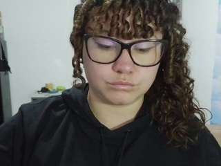 curly-greeneyed