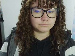 curly-greeneyed