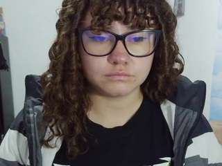 curly-greeneyed
