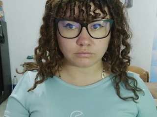 curly-greeneyed
