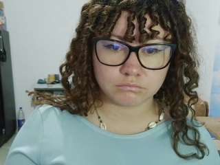curly-greeneyed