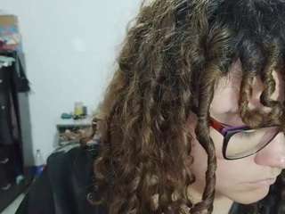 curly-greeneyed
