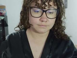 curly-greeneyed
