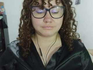 curly-greeneyed