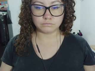curly-greeneyed